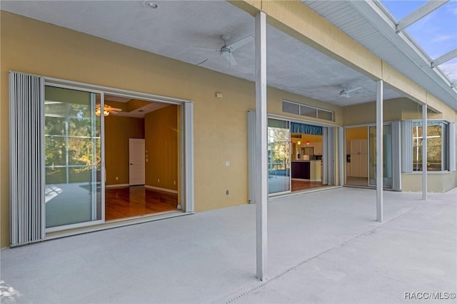 view of patio / terrace featuring ceiling fan