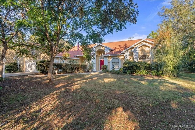 view of front of house with a front yard