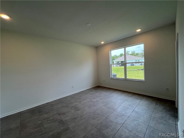 view of tiled spare room