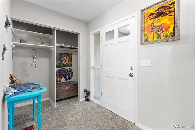 mudroom with light colored carpet