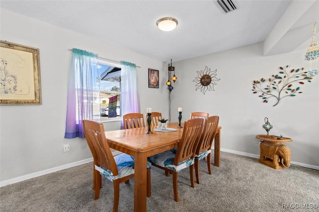 view of carpeted dining room