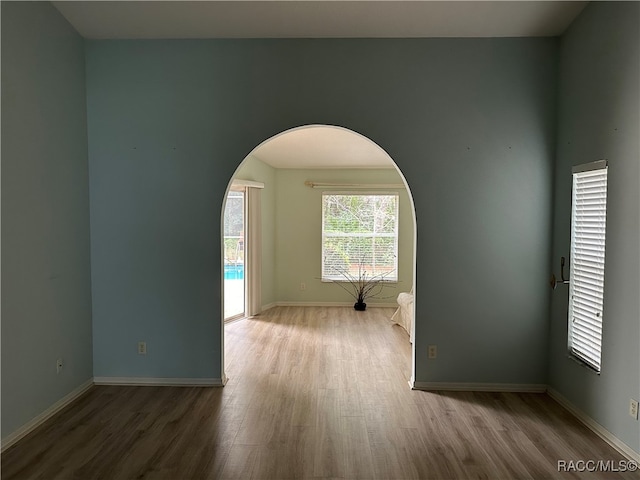 spare room featuring light wood-type flooring