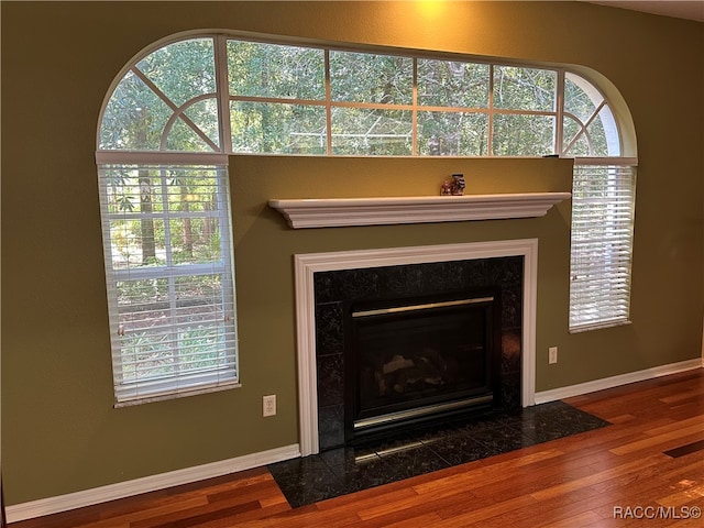 interior details featuring hardwood / wood-style floors