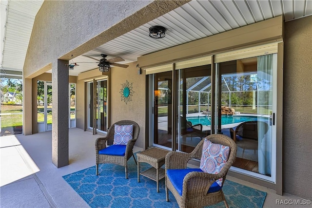 view of patio / terrace with a ceiling fan