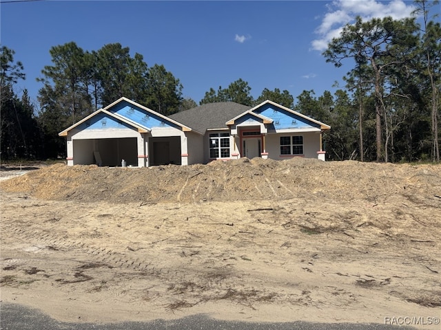 property in mid-construction featuring stucco siding