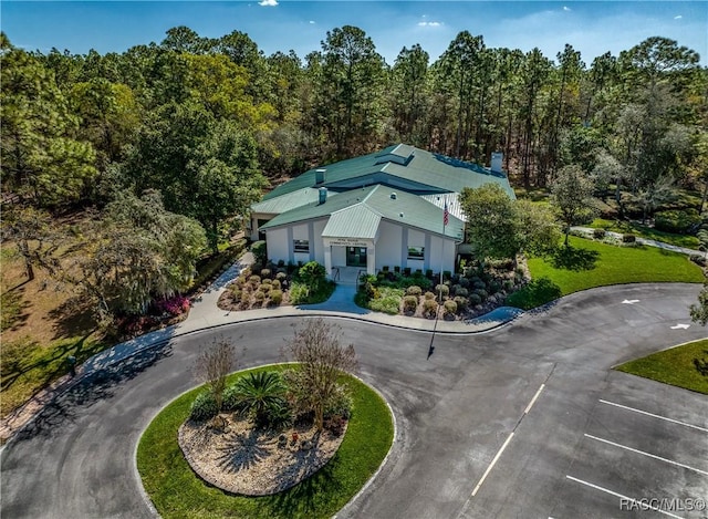 aerial view featuring a forest view