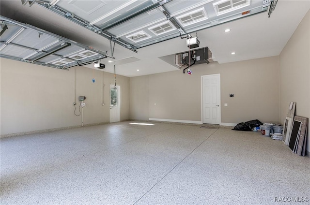 garage featuring baseboards and a garage door opener