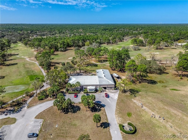 drone / aerial view with a view of trees