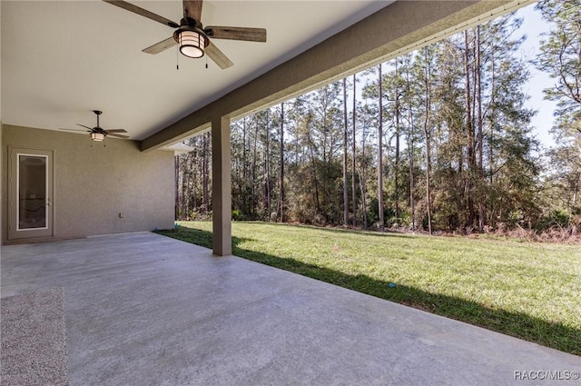 view of patio / terrace featuring ceiling fan