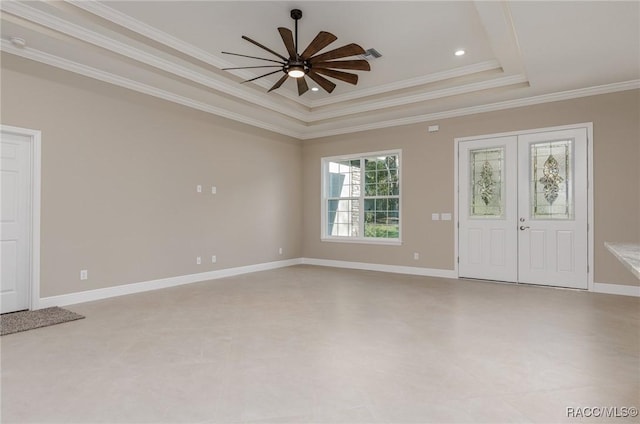 entrance foyer with baseboards, crown molding, a ceiling fan, and a raised ceiling