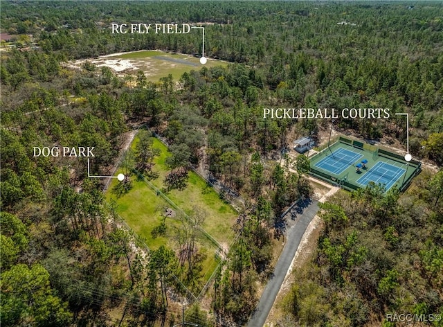 drone / aerial view with a view of trees