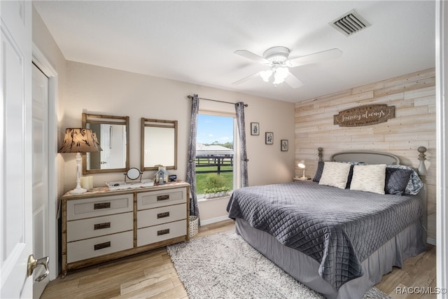 bedroom featuring ceiling fan and light wood-type flooring