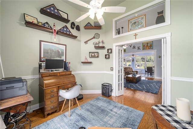 office area featuring ceiling fan, french doors, and light hardwood / wood-style flooring