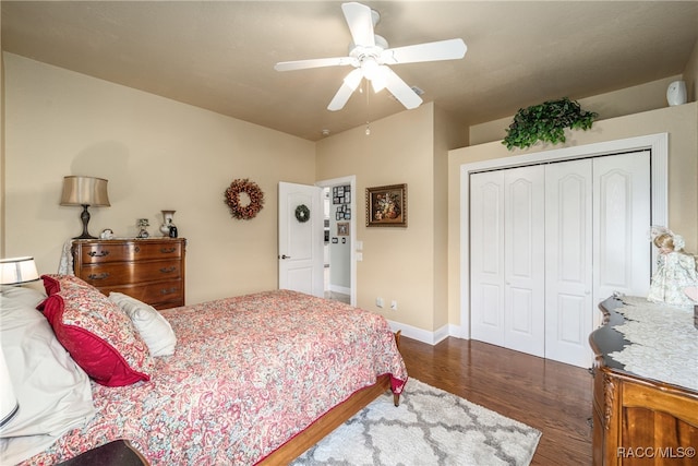 bedroom featuring dark hardwood / wood-style flooring, a closet, and ceiling fan