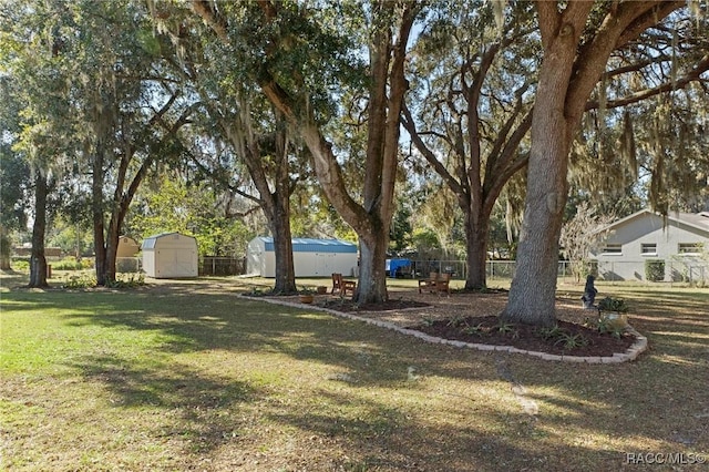 view of yard with a storage shed