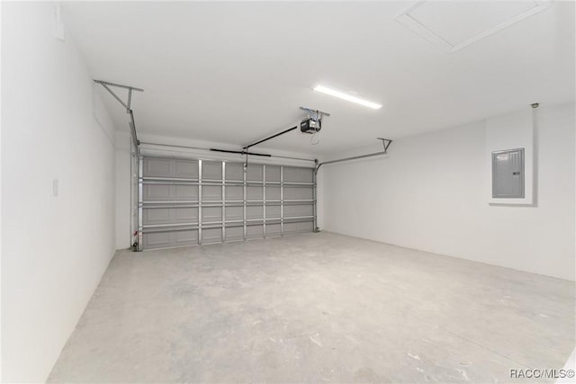 9065 N Arcadia Way, Citrus Springs, FL 34434 - garage featuring electric panel and a garage door opener