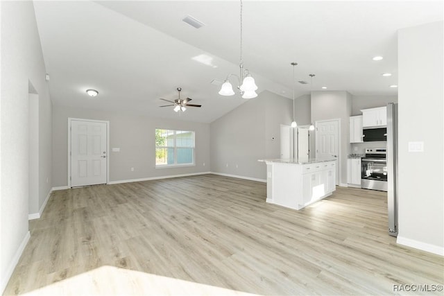 9065 N Arcadia Way, Citrus Springs, FL 34434 - unfurnished living room featuring light wood finished floors, ceiling fan with notable chandelier, baseboards, and visible vents