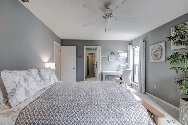 carpeted bedroom featuring ceiling fan