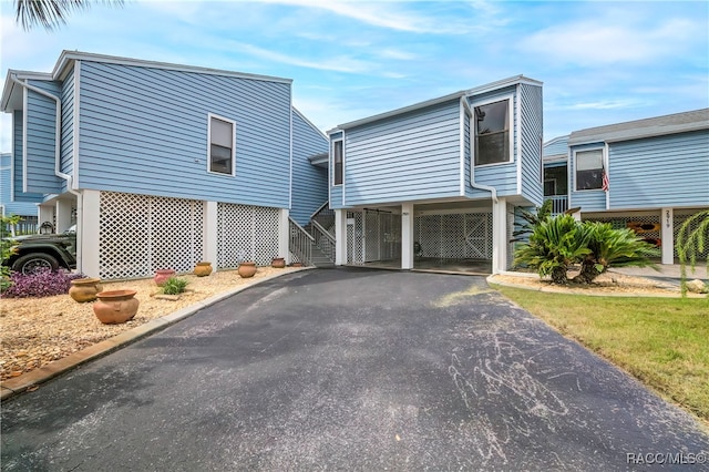 view of front of house with a carport