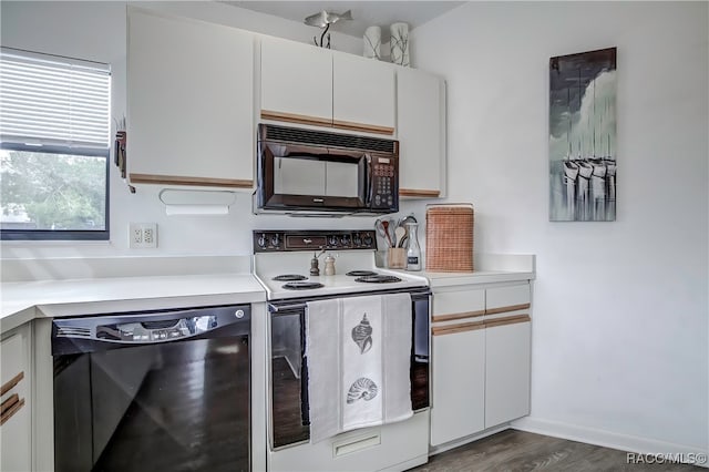 kitchen featuring white cabinets, dark hardwood / wood-style floors, and black appliances