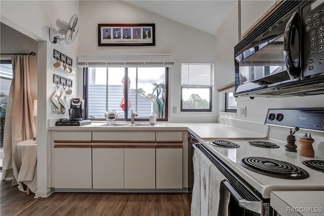 kitchen with dark hardwood / wood-style floors, white cabinetry, white electric range oven, and vaulted ceiling