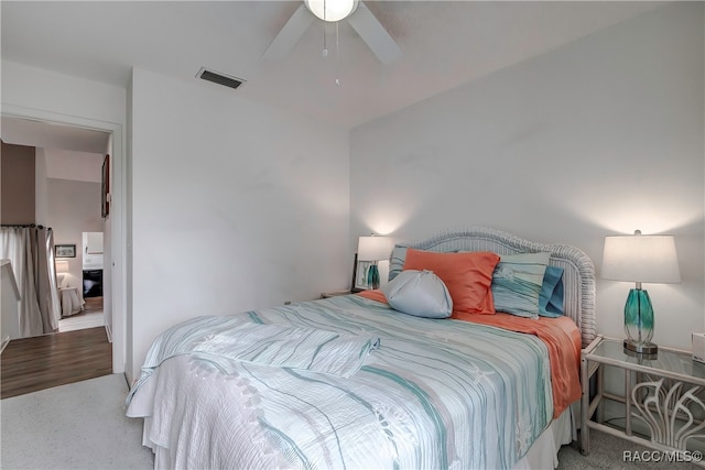 carpeted bedroom featuring ceiling fan