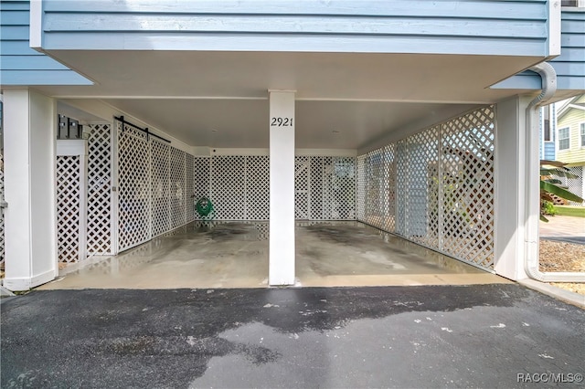 garage with a carport