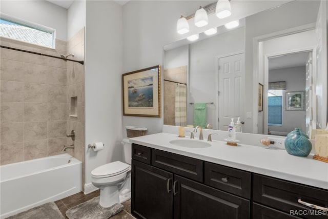 full bathroom featuring vanity, toilet, and shower / bath combo with shower curtain