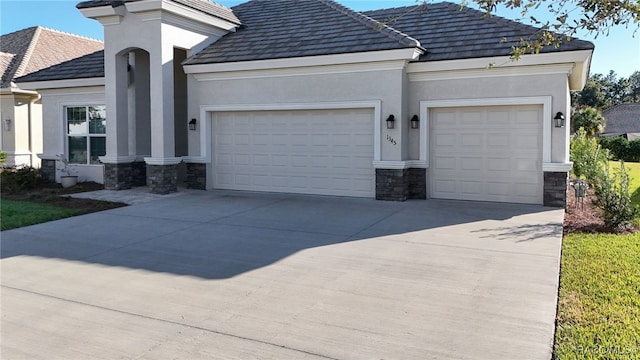 view of front of property with a garage