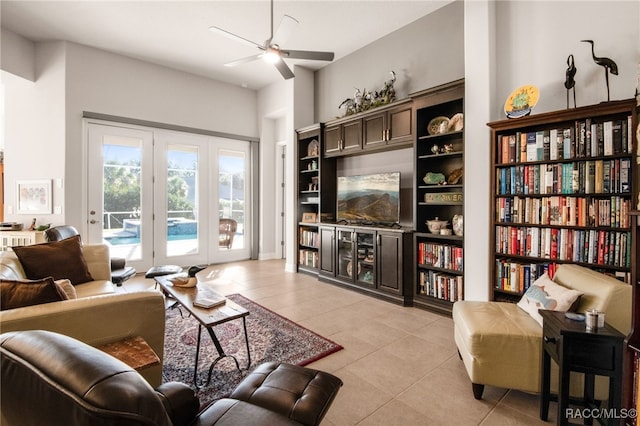 interior space featuring ceiling fan and french doors