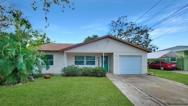 view of front of home with a carport and a front lawn