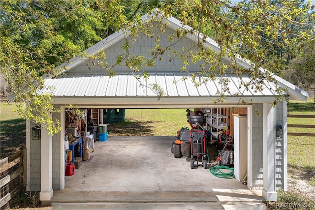 garage with fence