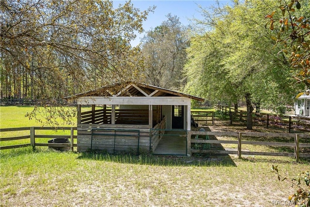 view of outdoor structure with a rural view, an outdoor structure, and an exterior structure