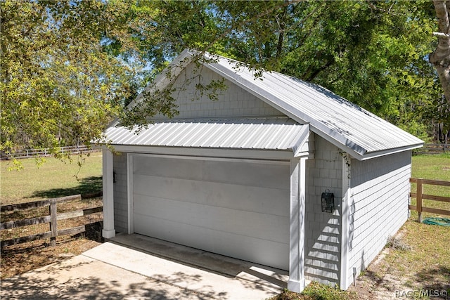 detached garage with fence