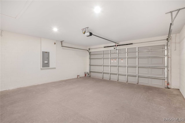 784 E Alaska Ln, Hernando, FL 34442 - garage with electric panel, a garage door opener, and concrete block wall