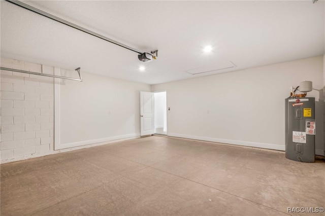 784 E Alaska Ln, Hernando, FL 34442 - garage featuring electric water heater and recessed lighting