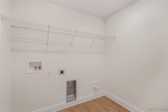 784 E Alaska Ln, Hernando, FL 34442 - washroom with hookup for a washing machine, light wood-style floors, and hookup for an electric dryer