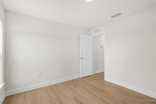 784 E Alaska Ln, Hernando, FL 34442 - empty room with light wood-style floors and baseboards