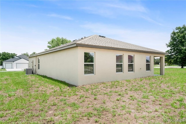 784 E Alaska Ln, Hernando, FL 34442 - view of home's exterior with stucco siding, a yard, and a garage