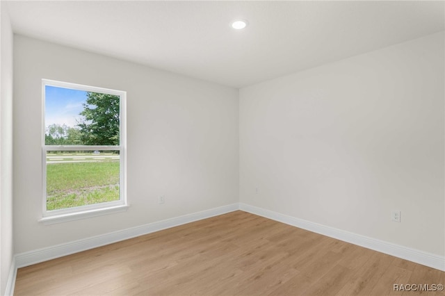 784 E Alaska Ln, Hernando, FL 34442 - empty room featuring light wood-style floors, healthy amount of natural light, and recessed lighting