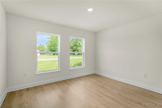 784 E Alaska Ln, Hernando, FL 34442 - empty room with light wood finished floors and recessed lighting