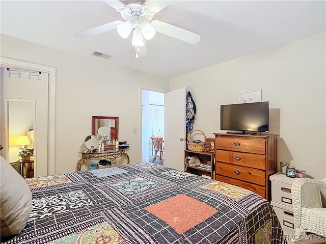 bedroom featuring ceiling fan