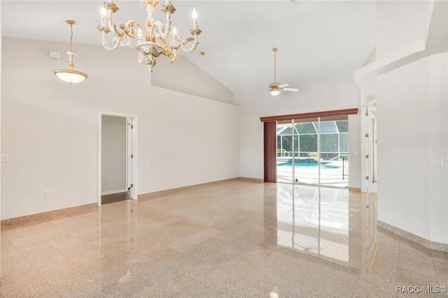 1324 Circus Ter, Hernando, FL 34442 - empty room featuring high vaulted ceiling, baseboards, and ceiling fan with notable chandelier