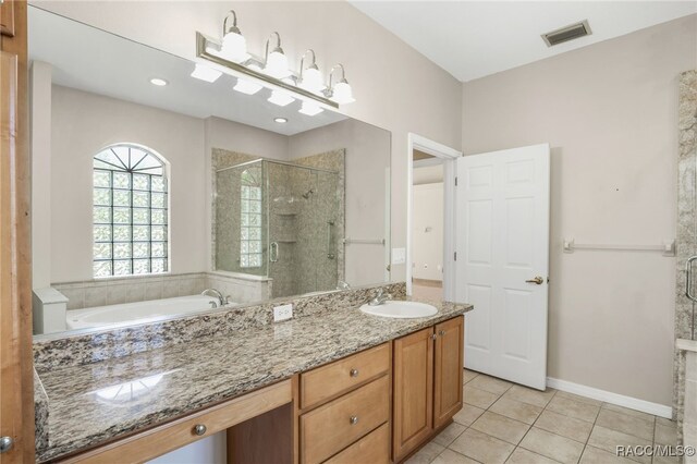 1324 Circus Ter, Hernando, FL 34442 - bathroom featuring vanity, tile patterned floors, a shower stall, and visible vents
