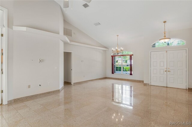 1324 Circus Ter, Hernando, FL 34442 - foyer entrance featuring baseboards, ceiling fan with notable chandelier, granite finish floor, and visible vents