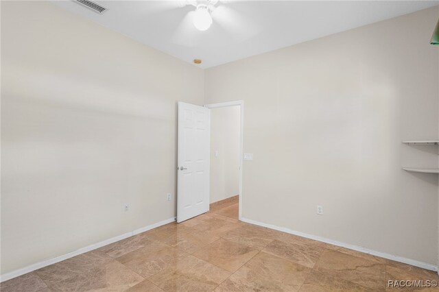 1324 Circus Ter, Hernando, FL 34442 - spare room featuring visible vents, a ceiling fan, and baseboards