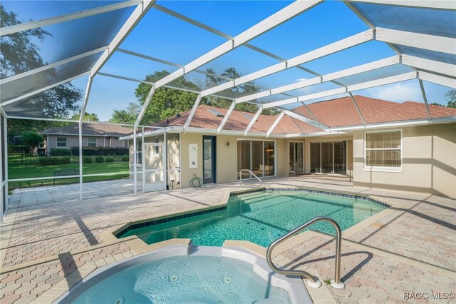 1324 Circus Ter, Hernando, FL 34442 - view of swimming pool with a lanai, a patio area, and a pool with connected hot tub