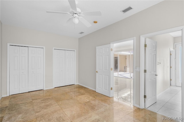 1324 Circus Ter, Hernando, FL 34442 - unfurnished bedroom with multiple closets, ceiling fan, ensuite bath, and visible vents