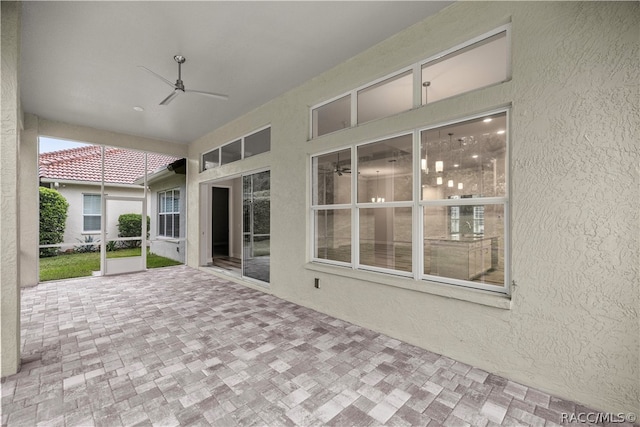 view of patio with ceiling fan