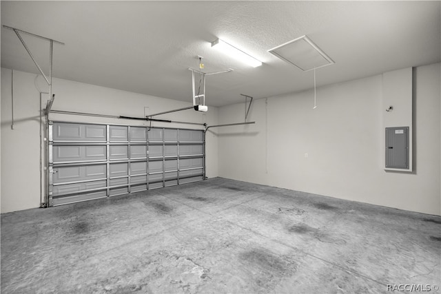 garage with a garage door opener and electric panel